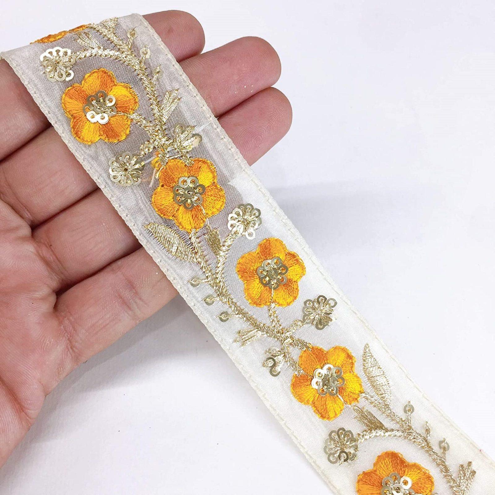 30mm Flower Design Embroidery Work and Sequins Work Ribbon, shown on white cotton