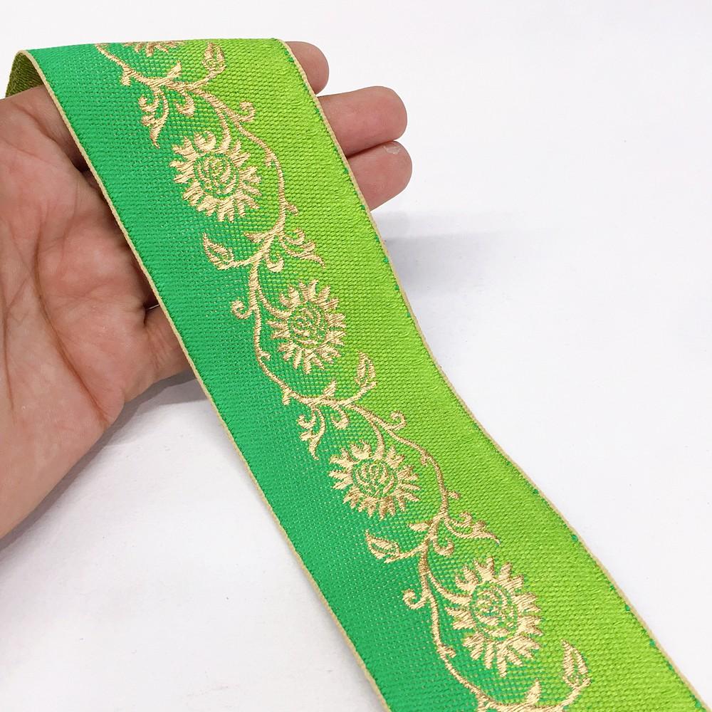 55mm shaded Jacquard Creeper Flower Design, shown on white cotton