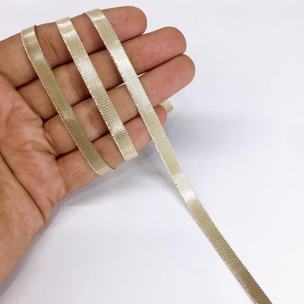 7 mm Metallic Shiny Plain Gota Ribbon, shown on white cotton