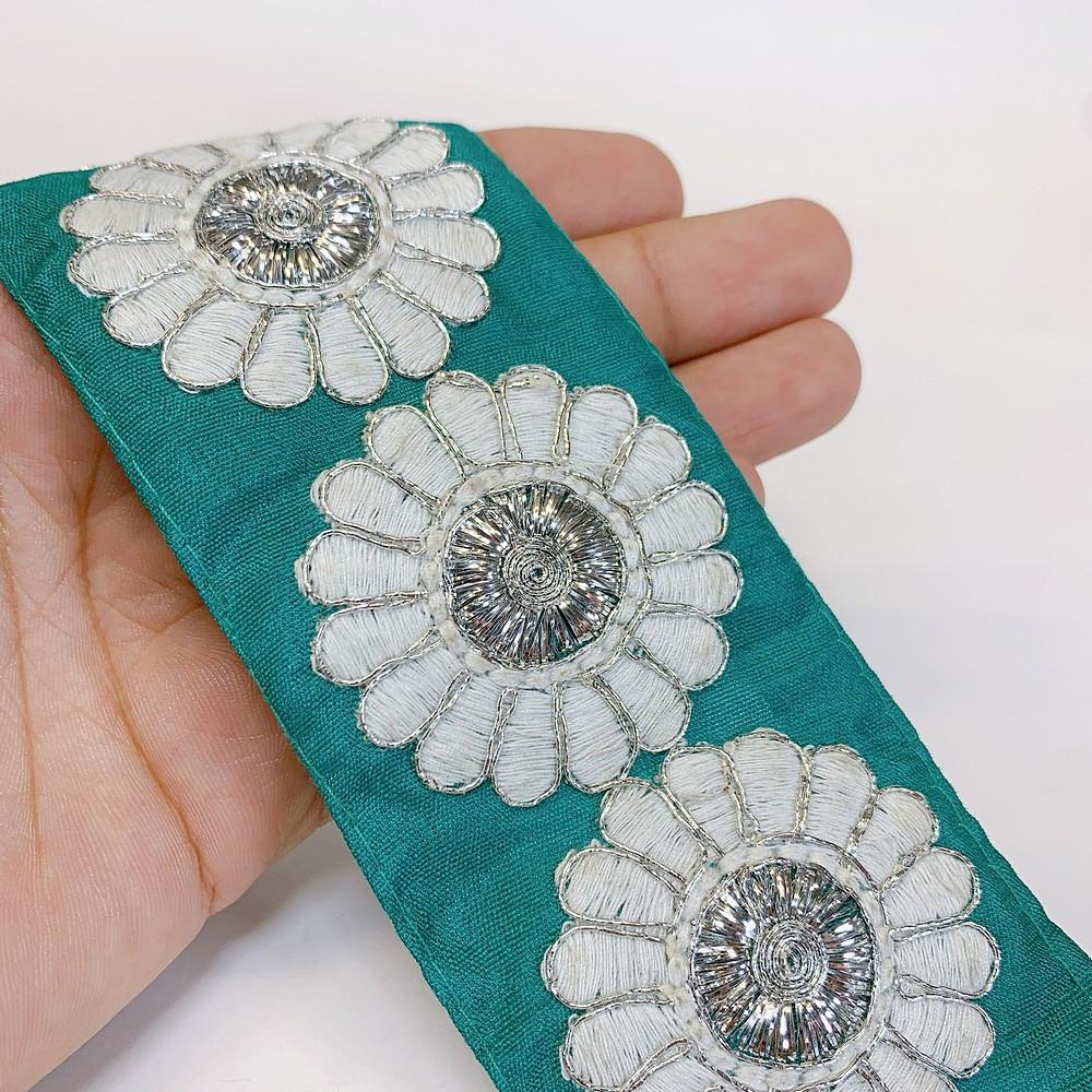 55mm Designer Flower Embroidery Lace With Dori Work, shown on white cotton