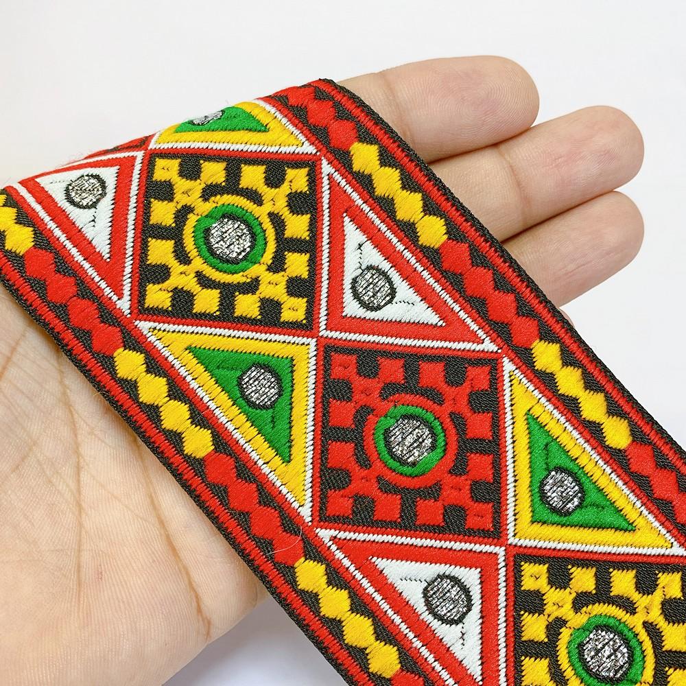 66 mm Kutchi Design Jacquard Lace With Zari Work, shown on white cotton