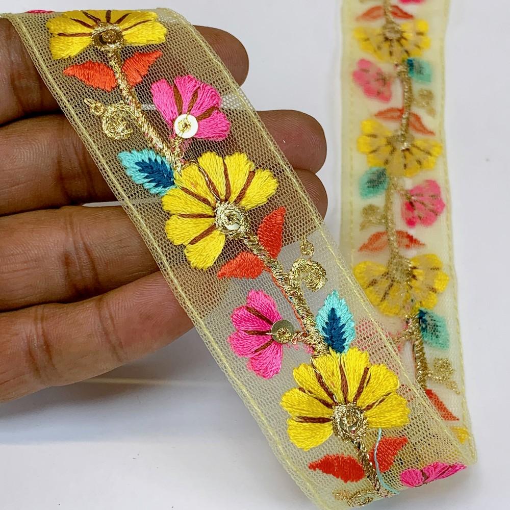 Lami 32 mm Designer Colorful Parsi Embroidery Lace, shown on white cotton