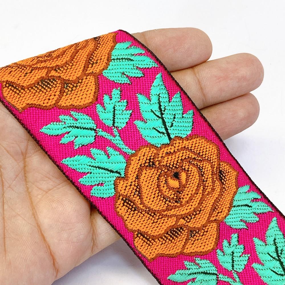 58 mm Rose Design Colourful Jacquard Ribbon, shown on white cotton