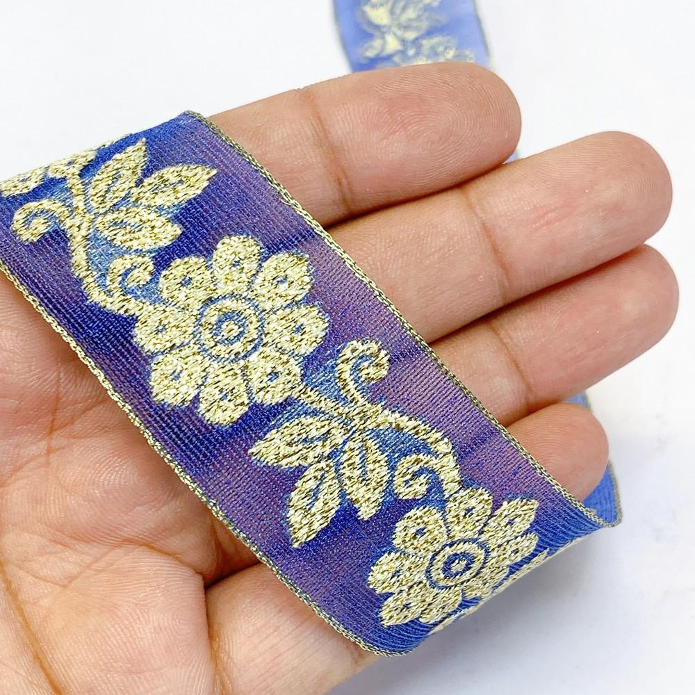 25mm Designer Jacquard Ribbon With Zari Threads, shown on white cotton