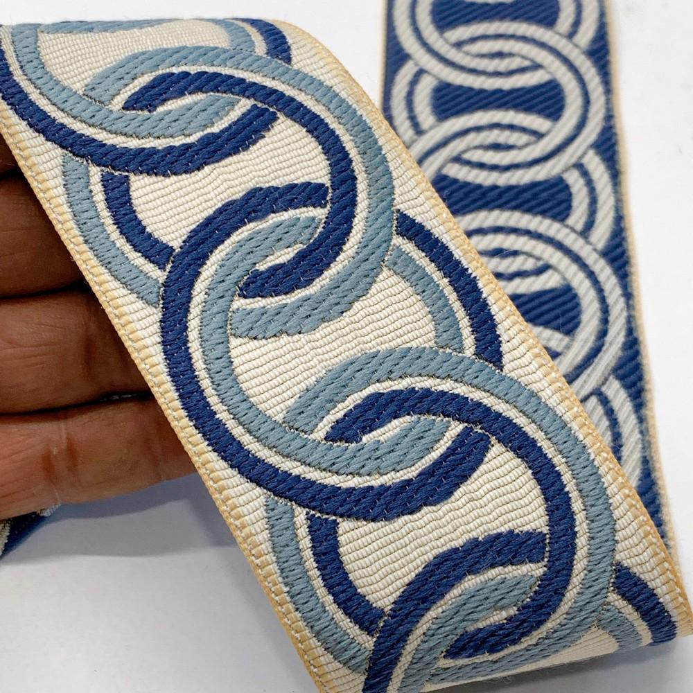55mm Elegant Tapestry Tape with Braided Chain Design, shown on white cotton