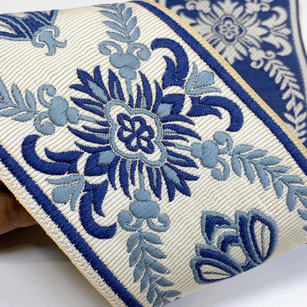 90mm Luxurious Floral & Bee Tapestry Tape, shown on white cotton