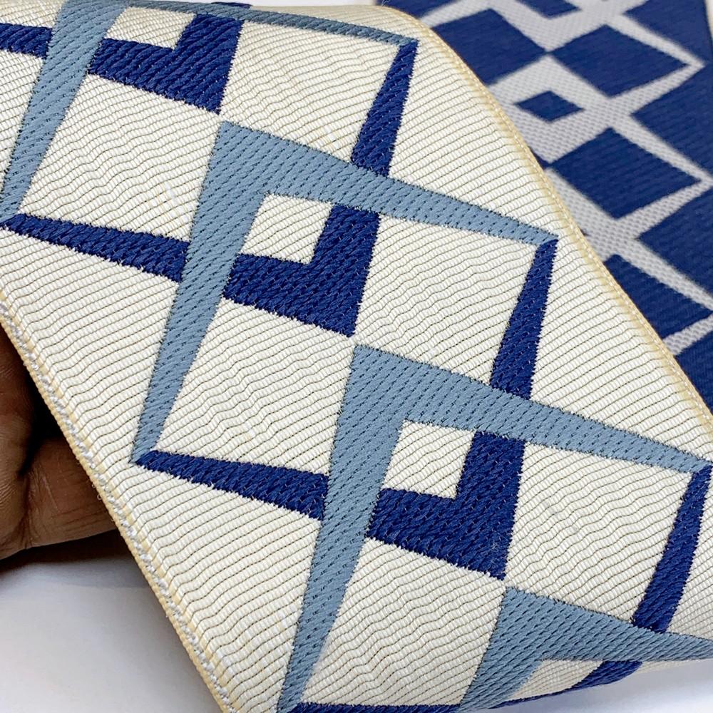 90mm Geometric Elegance Tapestry Tape, shown on white cotton