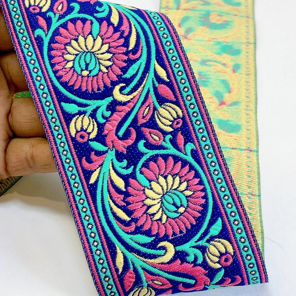 74mm Woven Jacquard Lotus & Vine Ribbon | Premium Ethnic Floral Trim | Wide Multi-Color Jacquard Border for Garments, shown on white cotton