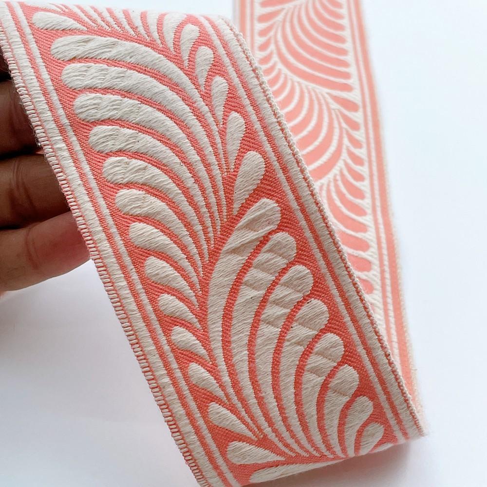 58mm Wide Botanical Leaf Pattern Lace Border for Sewing, Garments, DIY Crafts & Home Decor, shown on white cotton