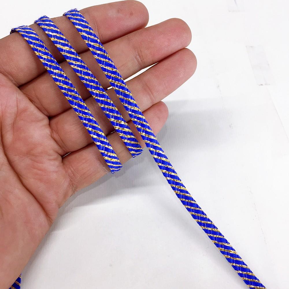 5mm Knitted Decorative Ribbon, shown on white cotton