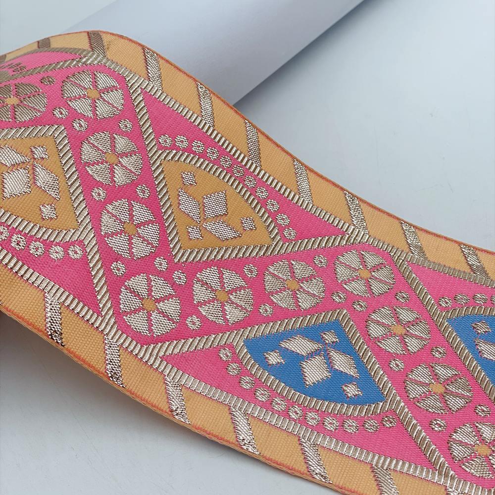 100mm Indian Gota Jacquard Ribbon Trim - Metallic Woven Tapestry Border for Ethnic Wear and Crafts, shown on white cotton