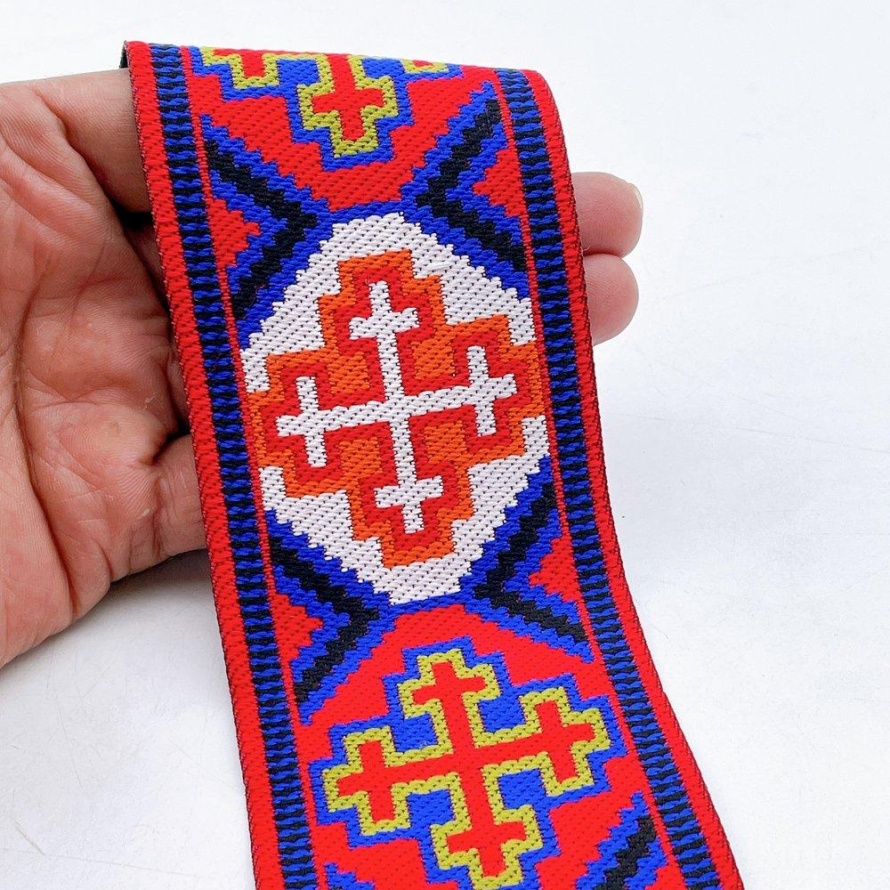 65mm Wide Tribal Jacquard Ribbon Trim - Colorful Geometric Tapestry Border for Bag Straps and Apparel, shown on white cotton