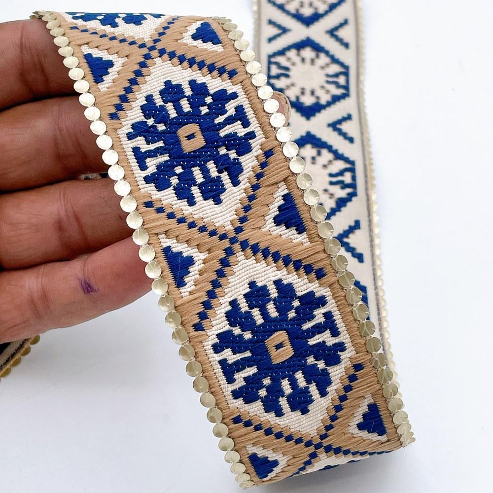 40mm Jacquard Ribbon Trim with Cotton Frill - Woven Geometric Border for Apparel and Crafts, shown on white cotton