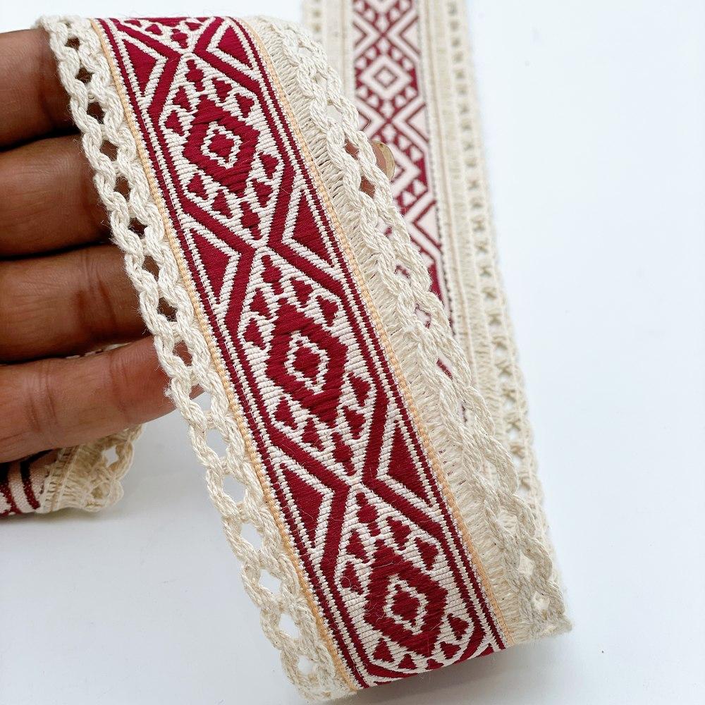 50mm Jacquard Ribbon Trim with Cotton Frill - Woven Geometric Border for Ethnic Wear, shown on white cotton