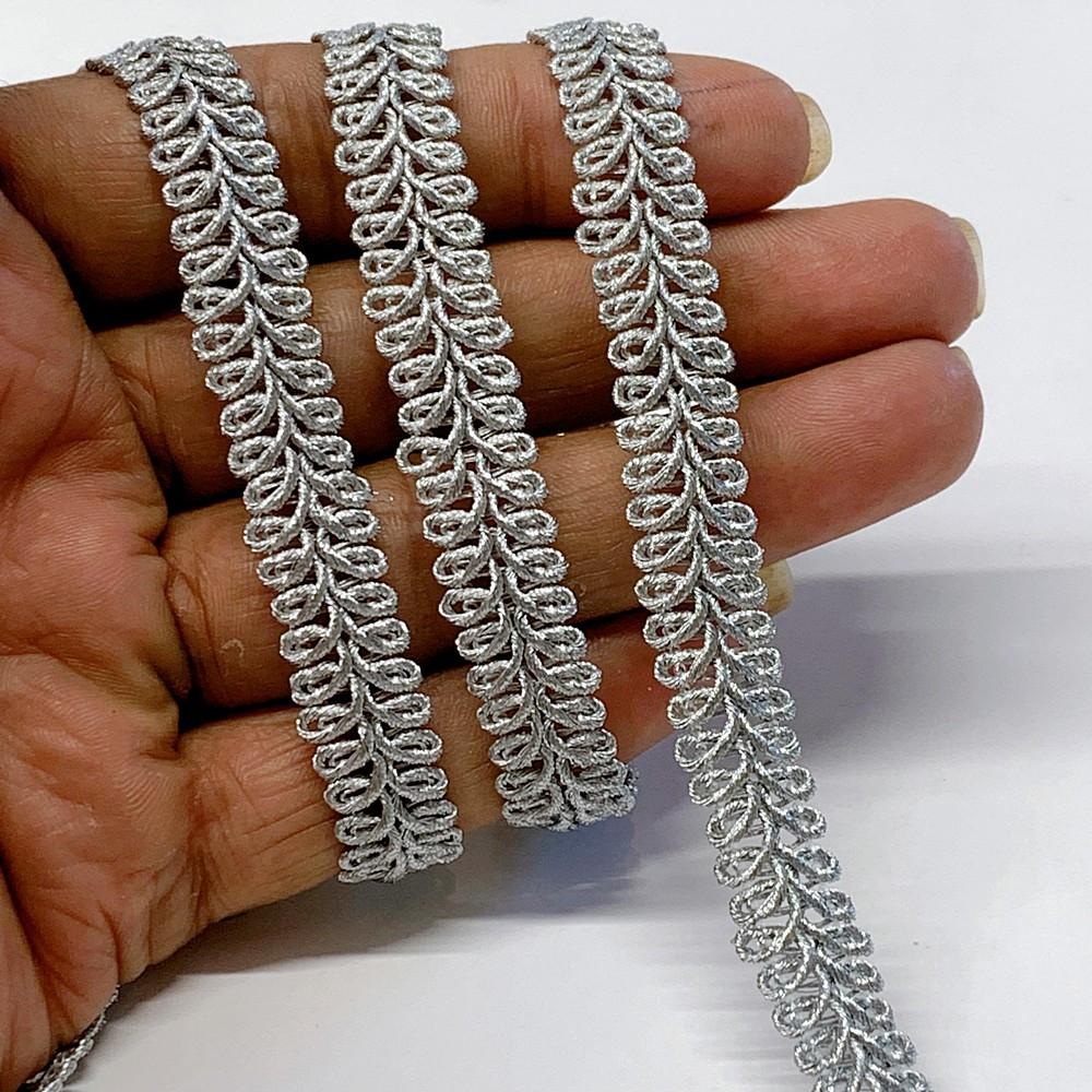 13 mm Knitted Decorative Ribbon, shown on white cotton