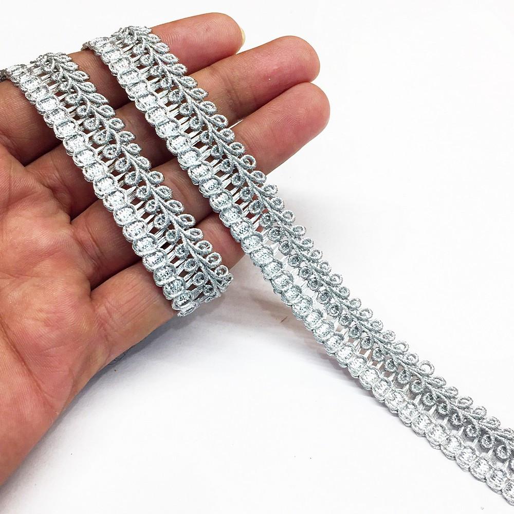 18 mm Knitted Decorative Ribbon, shown on white cotton