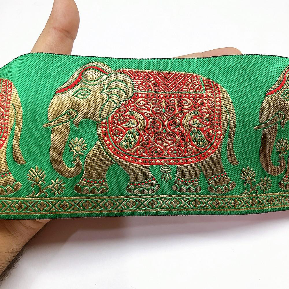 95mm Banarasi Jacquard Elephant Designer Ribbon, shown on white cotton