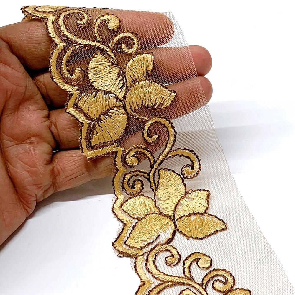 48 mm Designer Cutwork Embroidery Lace, shown on white cotton