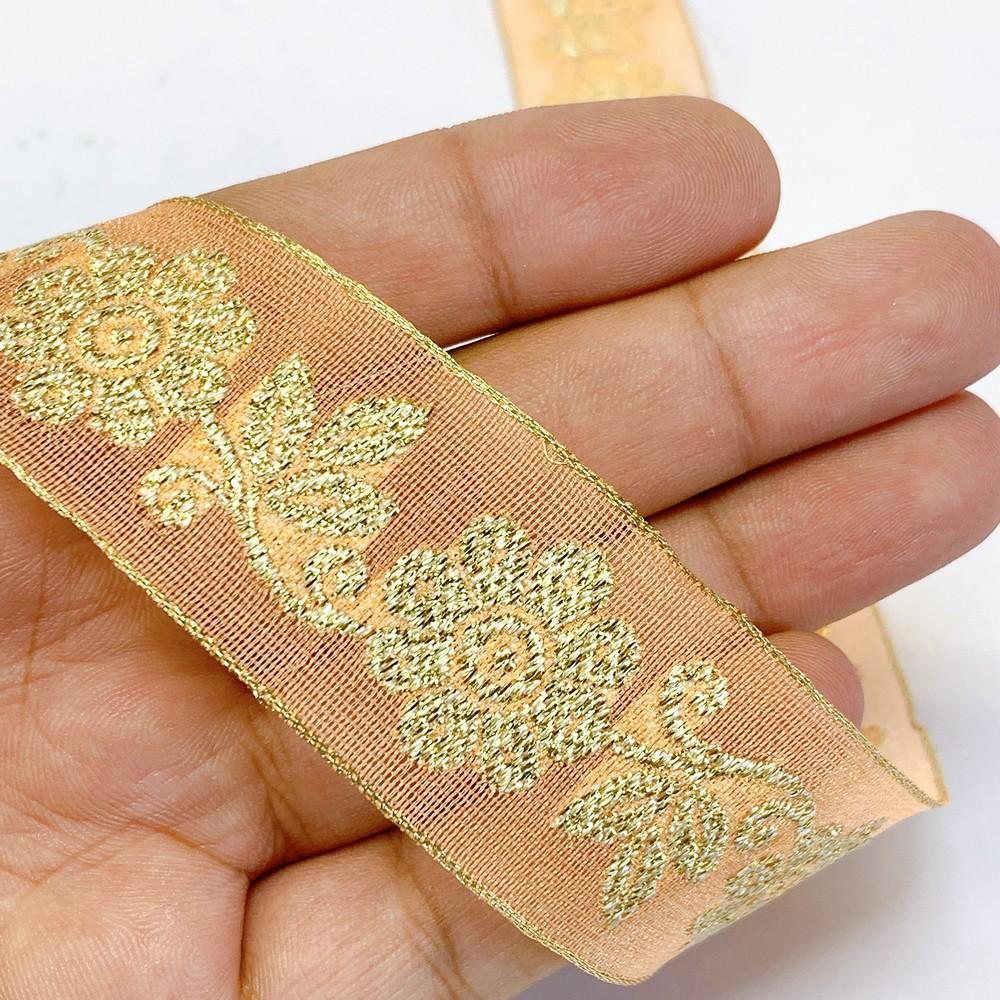 25mm Designer Jacquard Ribbon With Zari Threads, shown on white cotton