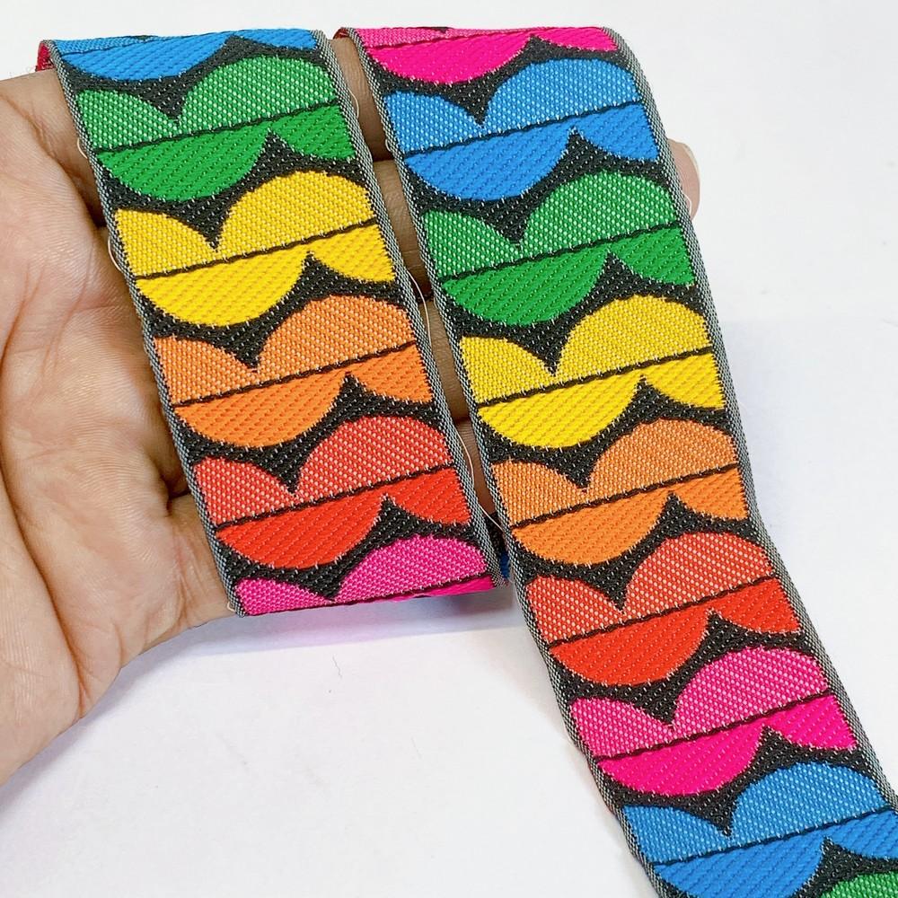 36mm Woven Jacquard Ribbon with Modern Leaf Pattern, shown on white cotton