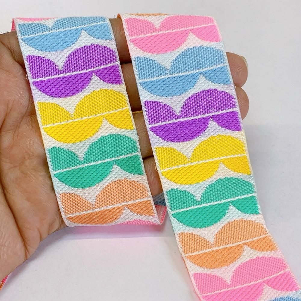 36mm Woven Jacquard Ribbon with Modern Leaf Pattern, shown on white cotton