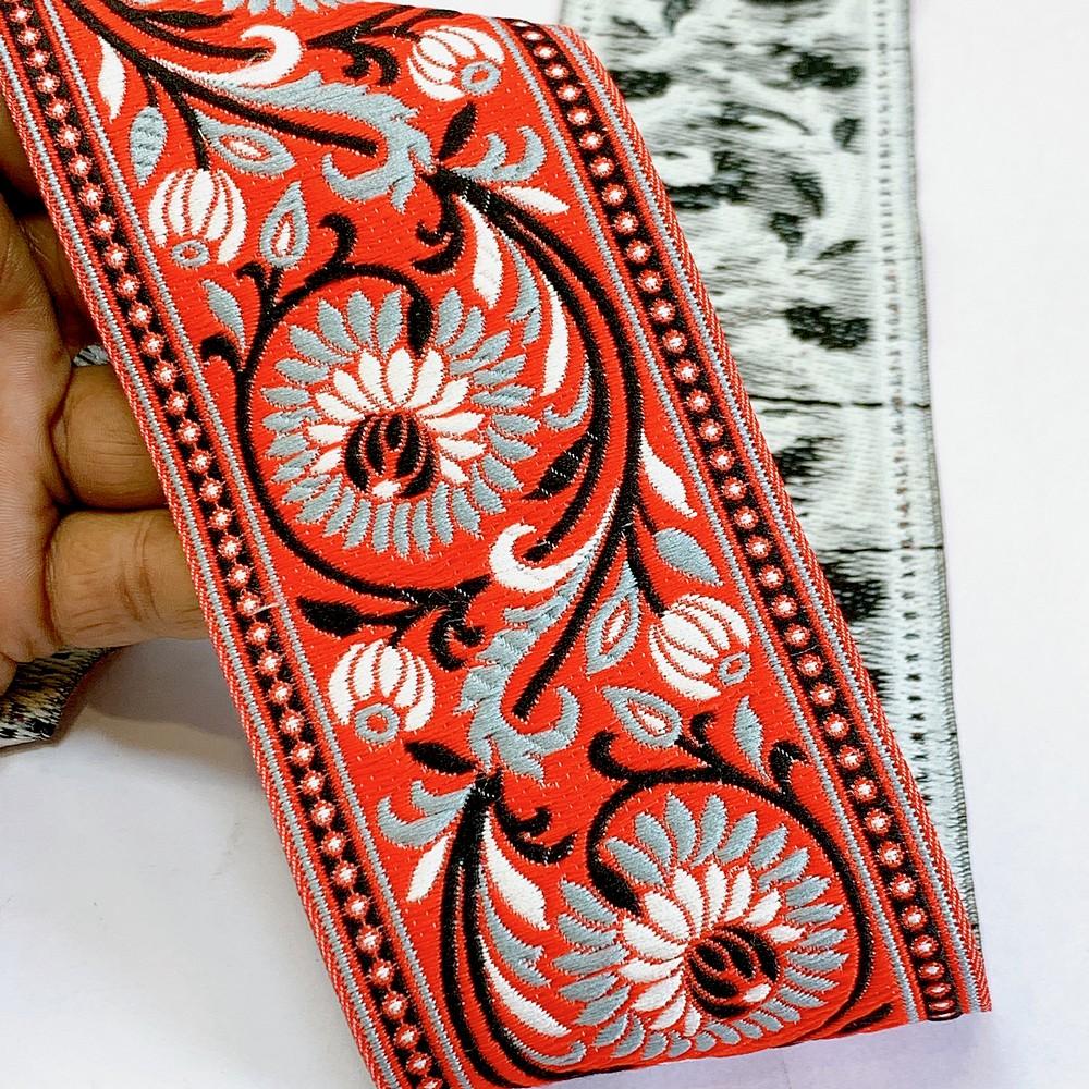 74mm Woven Jacquard Lotus & Vine Ribbon | Premium Ethnic Floral Trim | Wide Multi-Color Jacquard Border for Garments, shown on white cotton