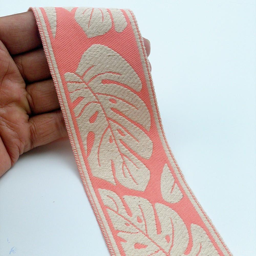 58mm Wide Tropical Monstera Leaf Pattern Lace Border for Sewing, Garments, DIY Crafts & Home Decor, shown on white cotton