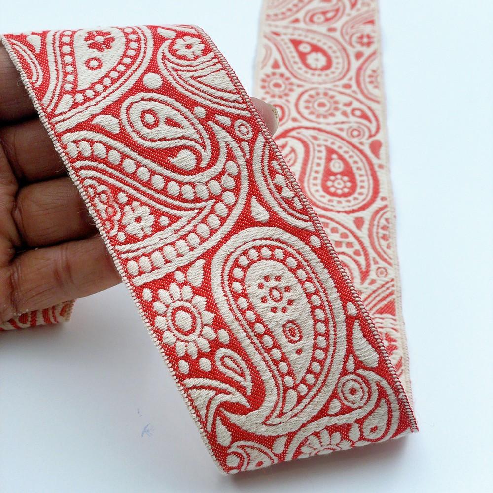 55mm Wide Traditional Paisley Motif Lace Border for Sewing, Garments, DIY Crafts & Home Decor, shown on white cotton