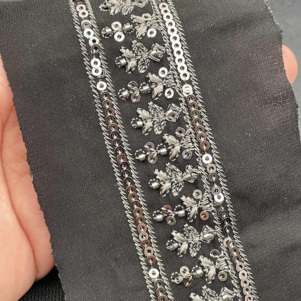 30mm Gunmetal Sequin and Cutdana Lace Trim - Heavy Embroidered Border for Evening Wear and Gowns, shown on white cotton
