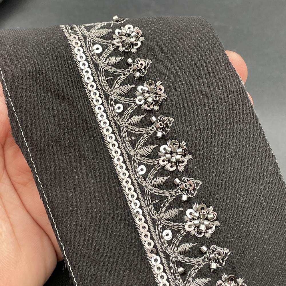 25mm Premium Handworked Floral Sequin Ribbon for Gowns and Lehengas, shown on white cotton