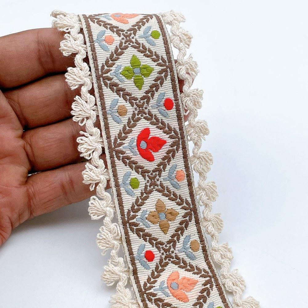 55mm Jacquard Ribbon Trim with Cotton Frill - Woven Geometric Border for Ethnic Wear, shown on white cotton