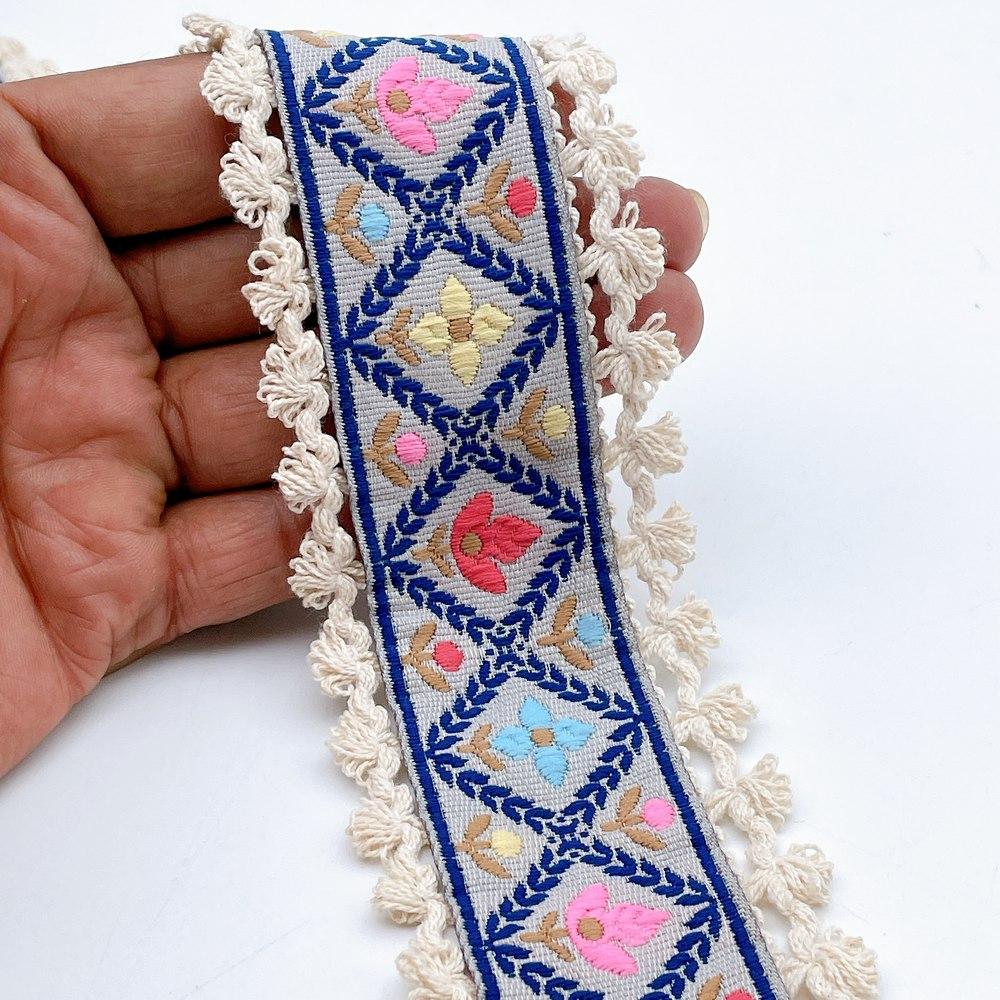 55mm Jacquard Ribbon Trim with Cotton Frill - Woven Geometric Border for Ethnic Wear, shown on white cotton